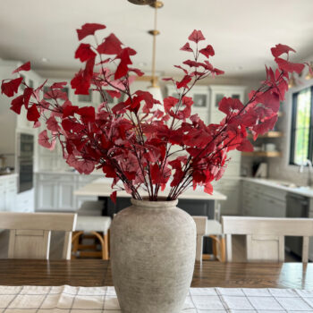 burgundy ginko branches in vase