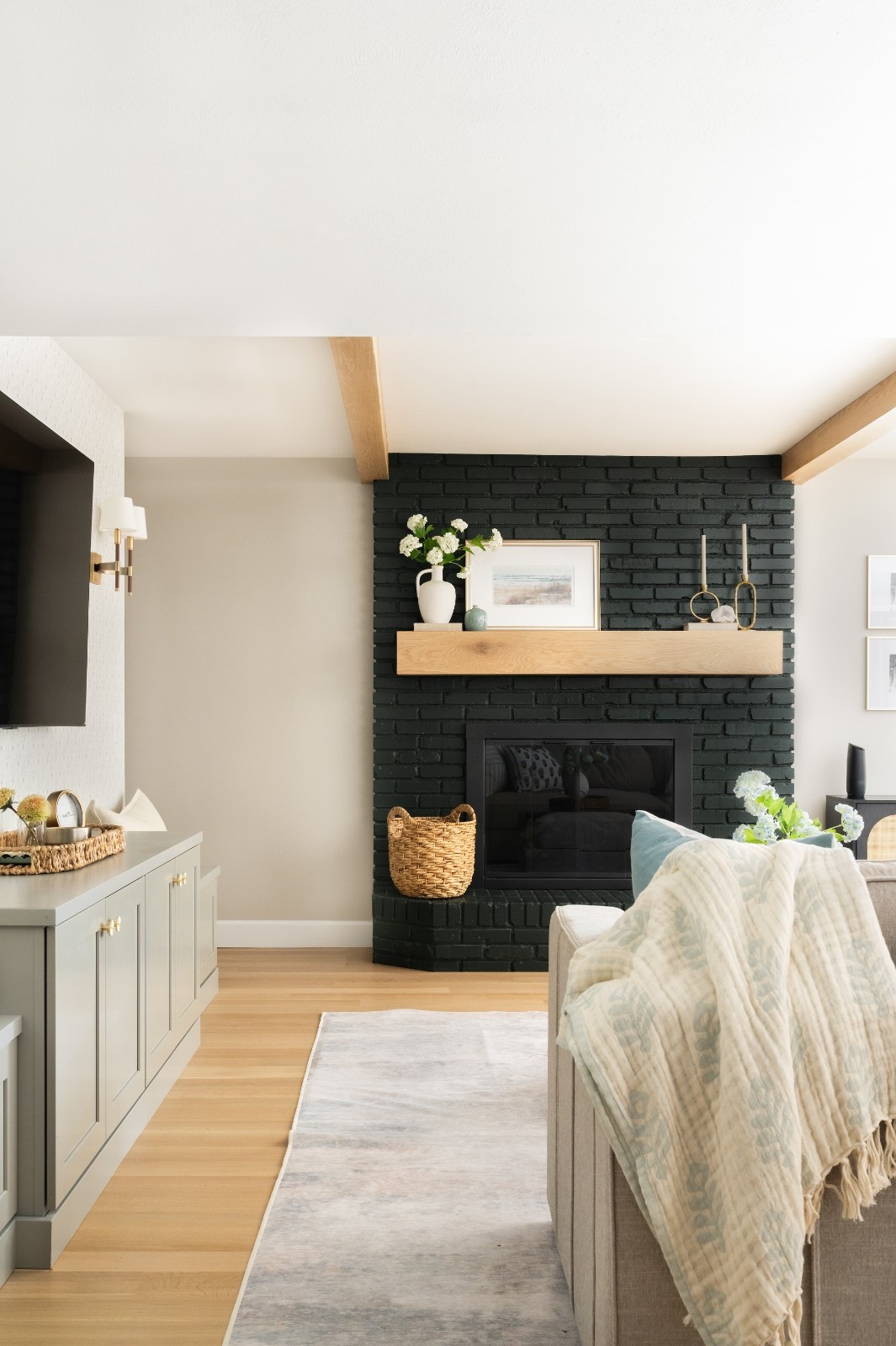 Casual and Airy Basement Living Room with fireplace